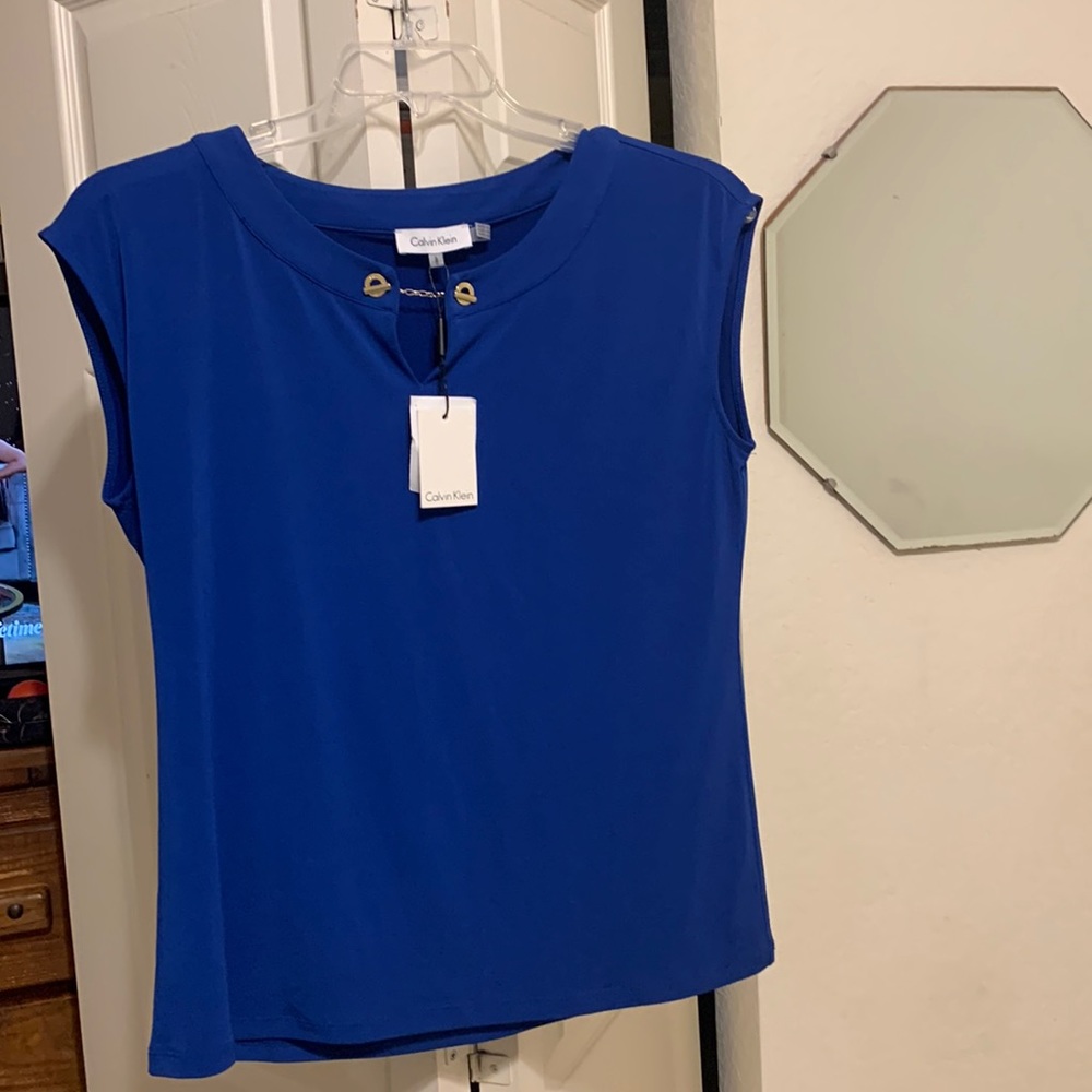 Calvin Klein, brand new, tags on blouse, short sleeves, Size L